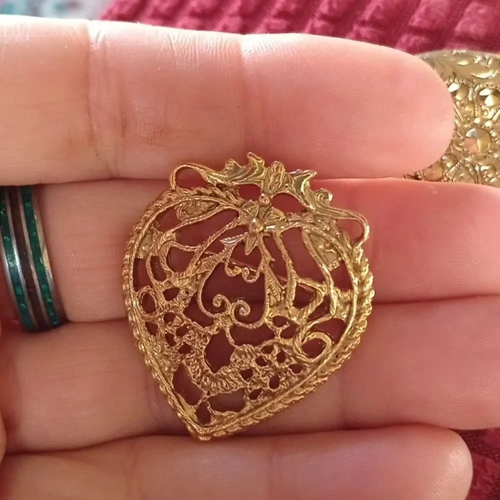 Three vintage brooches
